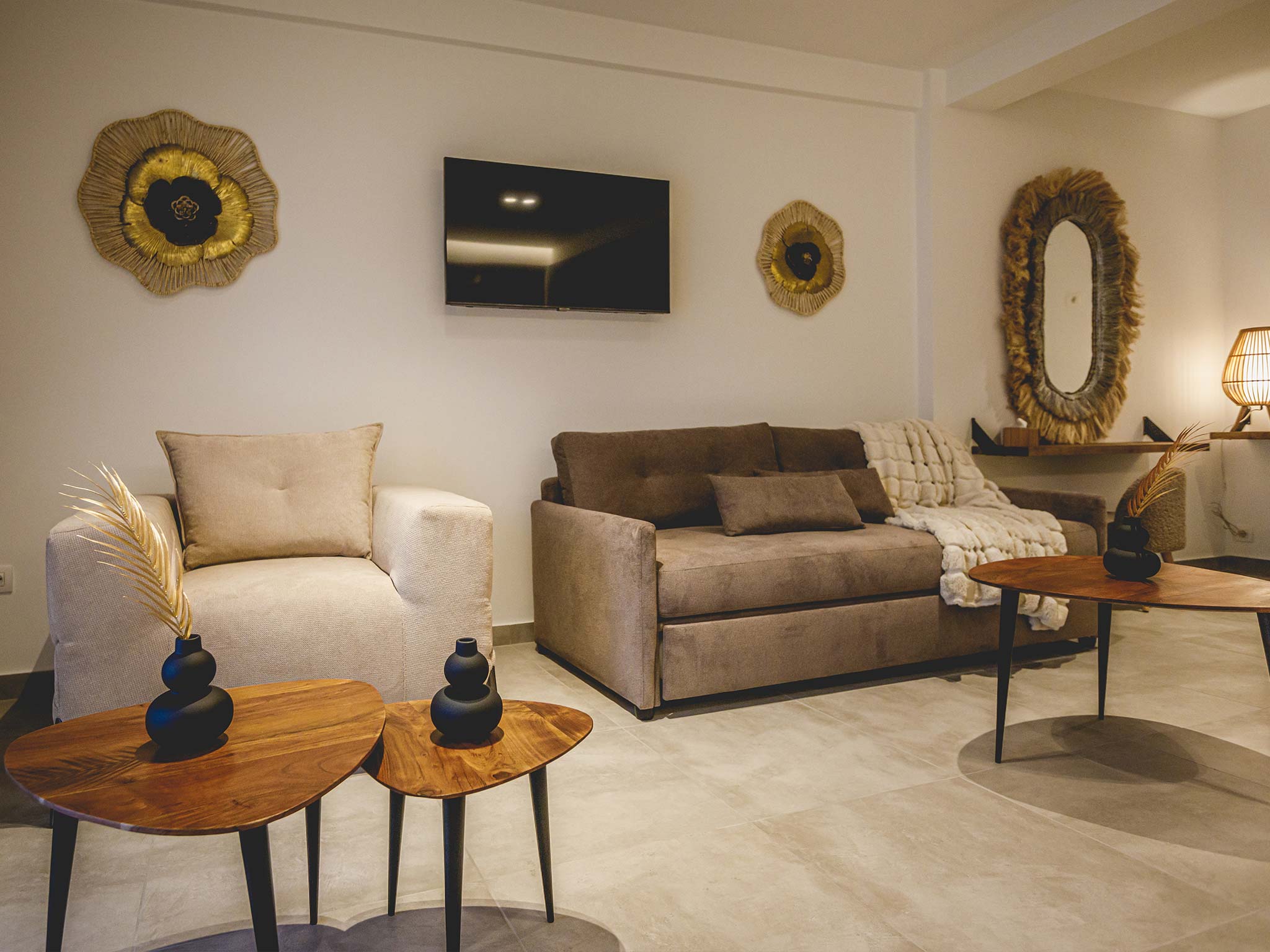 a living room with a couch and a tv